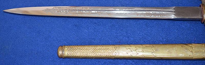THIRD REICH NAVAL DAGGER WITH SAILING SHIP ETCHED BLADE BY HOLLER COMPLETE WITH GOLD KNOT.