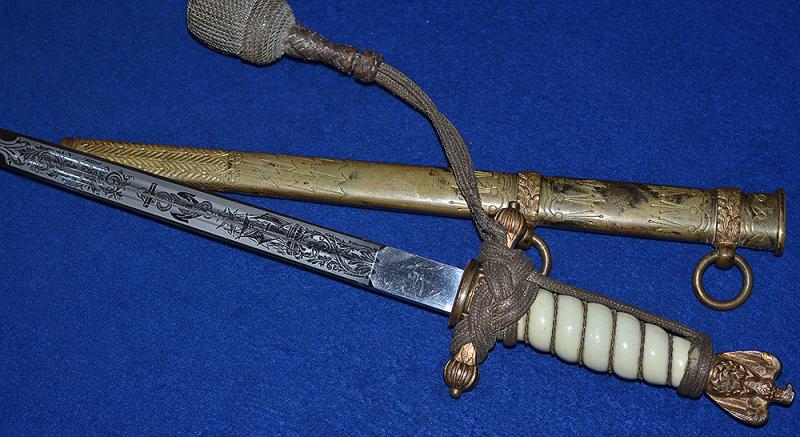THIRD REICH NAVAL DAGGER WITH SAILING SHIP ETCHED BLADE BY HOLLER COMPLETE WITH GOLD KNOT.