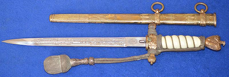 THIRD REICH NAVAL DAGGER WITH SAILING SHIP ETCHED BLADE BY HOLLER COMPLETE WITH GOLD KNOT.