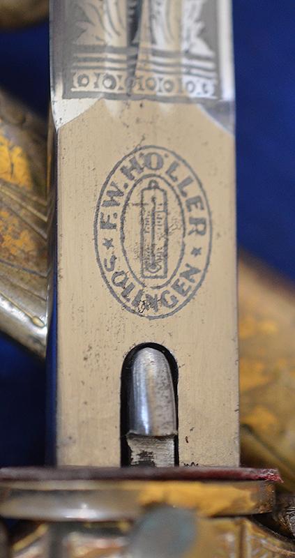 THIRD REICH NAVAL DAGGER WITH SAILING SHIP ETCHED BLADE BY HOLLER COMPLETE WITH GOLD KNOT.