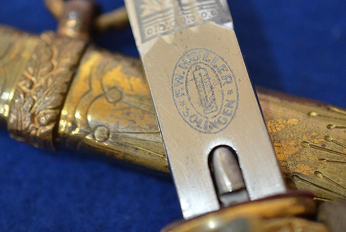 THIRD REICH NAVAL DAGGER WITH SAILING SHIP ETCHED BLADE BY HOLLER COMPLETE WITH GOLD KNOT.