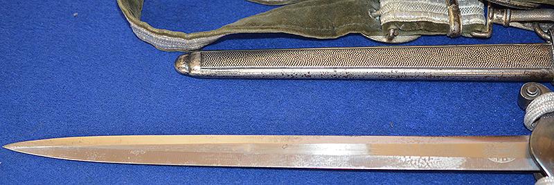 THIRD REICH ARMY OFFICERS DAGGER BY HOLLER COMPLETE WITH STRAPS AND KNOT.