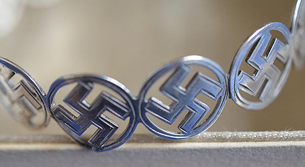 BRITISH 1920'S SILVER SWASTIKA DECORATED BANGLE COMPLETE WITH BOX.