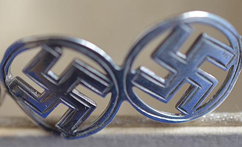 BRITISH 1920'S SILVER SWASTIKA DECORATED BANGLE COMPLETE WITH BOX.