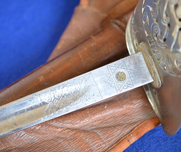 BRITISH WW1 ARMY OFFICERS SWORD WITH ORIGINAL LEATHER STORAGE BAG.