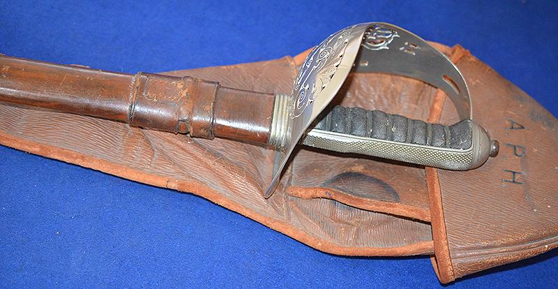 BRITISH WW1 ARMY OFFICERS SWORD WITH ORIGINAL LEATHER STORAGE BAG.