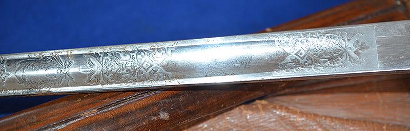 BRITISH WW1 ARMY OFFICERS SWORD WITH ORIGINAL LEATHER STORAGE BAG.