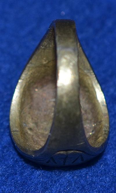 SWASTIKA DECORATED FINGER RING.