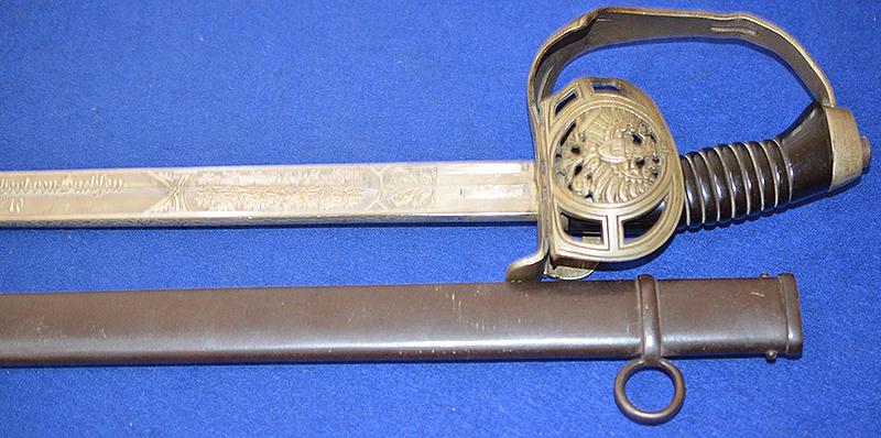 IMPERIAL GERMAN CAVALRY OFFICERS SWORD BY EICKHORN WITH SUPERB ENGRAVED BLADE.