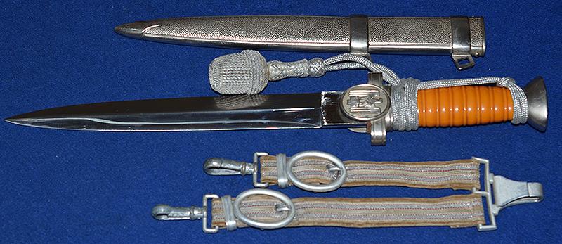 RED CROSS LEADERS DAGGER COMPLETE WITH STRAPS AND KNOT, MINT CONDITION.