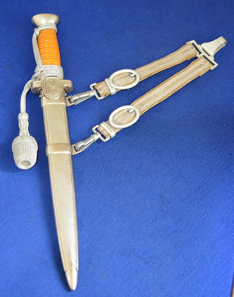 RED CROSS LEADERS DAGGER COMPLETE WITH STRAPS AND KNOT, MINT CONDITION.