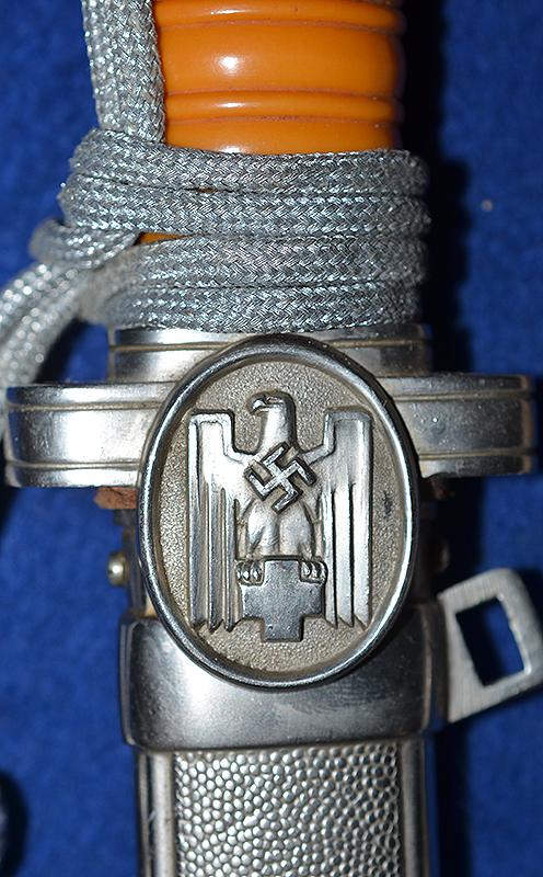 RED CROSS LEADERS DAGGER COMPLETE WITH STRAPS AND KNOT, MINT CONDITION.