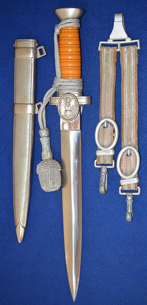 RED CROSS LEADERS DAGGER COMPLETE WITH STRAPS AND KNOT, MINT CONDITION.