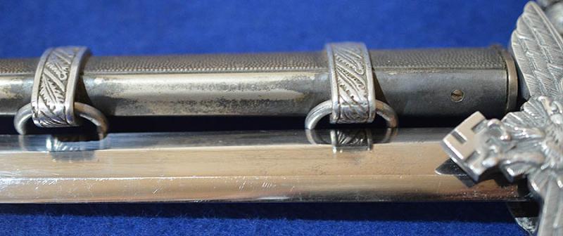 LUFTWAFFE 2ND MODEL DAGGER BY SMF, COMPLETE WITH DELUXE STRAPS AND SILVER KNOT, NEAR MINT.