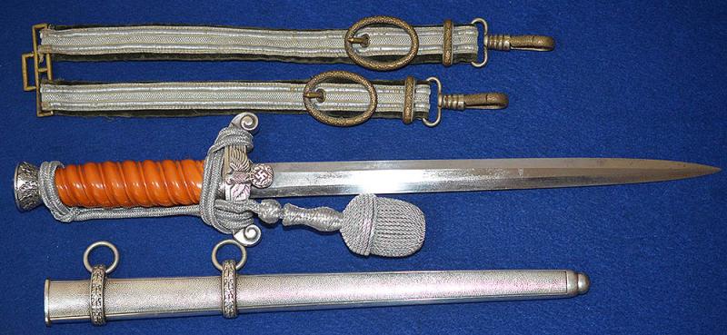 GERMAN ARMY OFFICER DAGGER 1935 MODEL BY HOLLER COMPLETE WITH STRAPS AND KNOT.