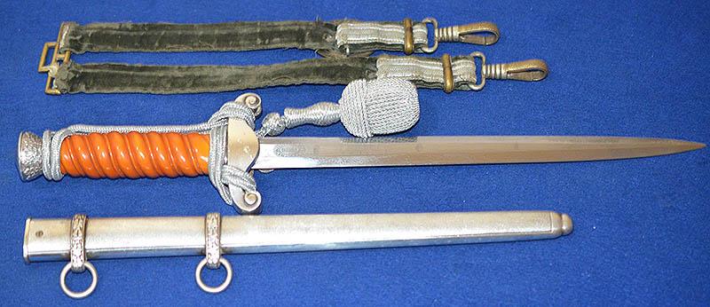 GERMAN ARMY OFFICER DAGGER 1935 MODEL BY HOLLER COMPLETE WITH STRAPS AND KNOT.