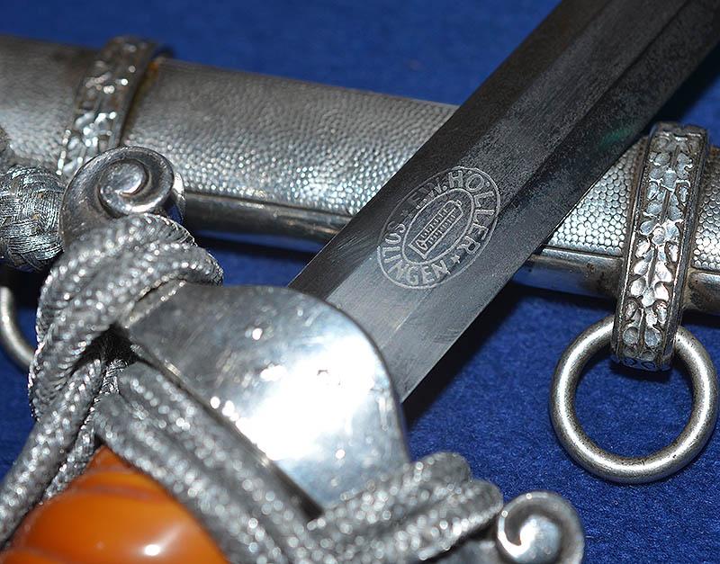 GERMAN ARMY OFFICER DAGGER 1935 MODEL BY HOLLER COMPLETE WITH STRAPS AND KNOT.
