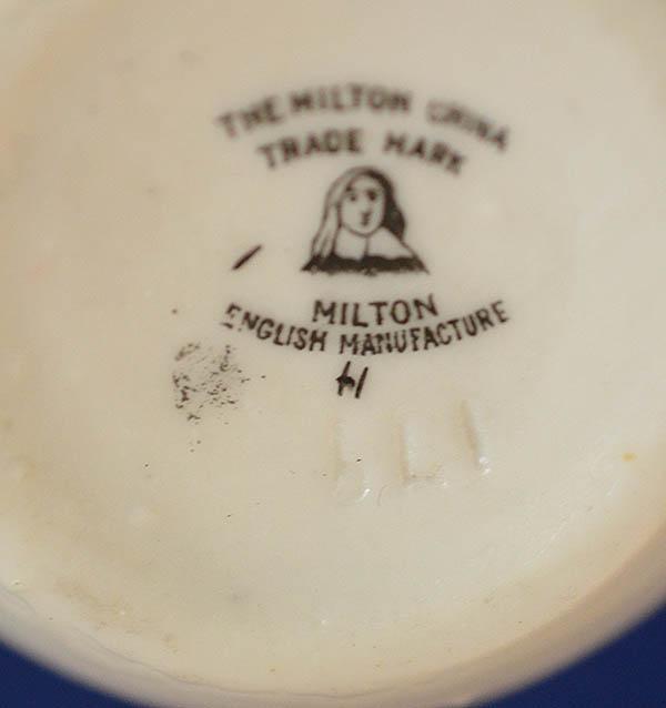 BRITISH CREAM JUG DEPICTING A CAT DECORATED WITH SWASTIKA.