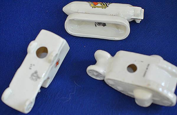 SET OF THREE WW1 CRESTED CHINA MILITARY MODELS.