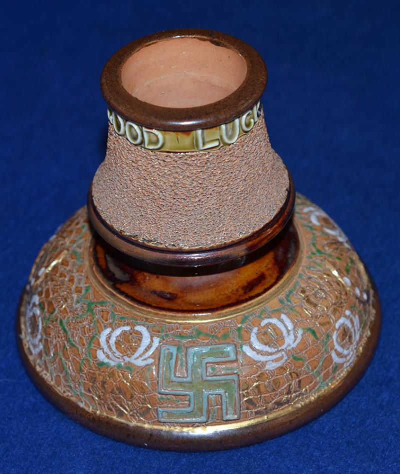 ENGLISH SWASTIKA DECORATED POTTERY MATCH STRIKER BY DOULTON.