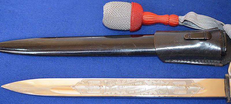 GERMAN ARMY LONG MODEL PARADE BAYONET BY EICKHORN WITH ENGRAVED BLADE,COMPLETE WITH FROG AND KNOT,MINT CONDITION.