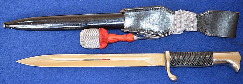 GERMAN ARMY LONG MODEL PARADE BAYONET BY EICKHORN WITH ENGRAVED BLADE,COMPLETE WITH FROG AND KNOT,MINT CONDITION.