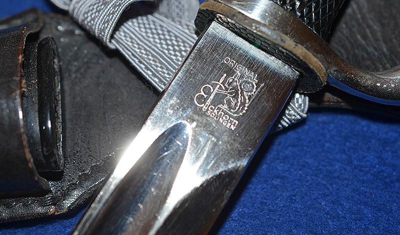 GERMAN ARMY LONG MODEL PARADE BAYONET BY EICKHORN WITH ENGRAVED BLADE,COMPLETE WITH FROG AND KNOT,MINT CONDITION.
