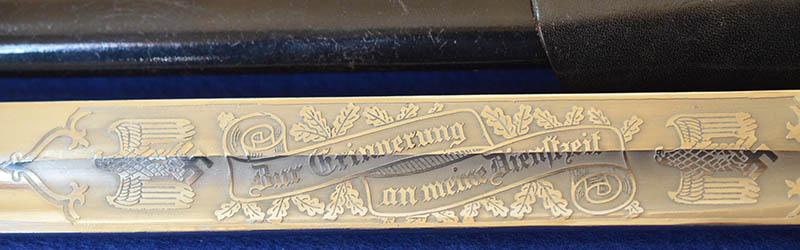 GERMAN ARMY LONG MODEL PARADE BAYONET BY EICKHORN WITH ENGRAVED BLADE,COMPLETE WITH FROG AND KNOT,MINT CONDITION.