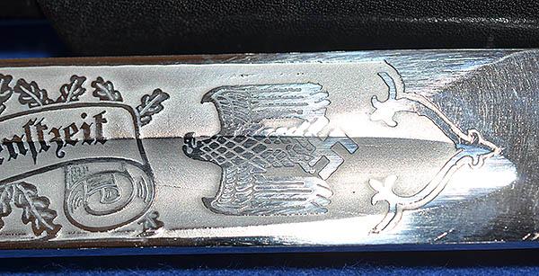 GERMAN ARMY LONG MODEL PARADE BAYONET BY EICKHORN WITH ENGRAVED BLADE,COMPLETE WITH FROG AND KNOT,MINT CONDITION.