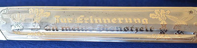 LUFTWAFE SHORT MODEL PARADE BAYONET BY SEILHEIMER COMPLETE WITH ENGRAVED BLADE AND BROWN LEATHER FROG.