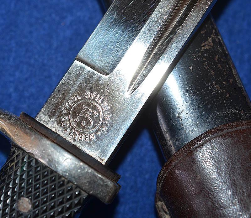 LUFTWAFE SHORT MODEL PARADE BAYONET BY SEILHEIMER COMPLETE WITH ENGRAVED BLADE AND BROWN LEATHER FROG.