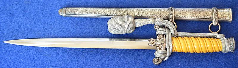 GERMAN ARMY OFFICERS DAGGER 1935 MODEL BY HOLLER COMPLETE WITH SILVER KNOT.