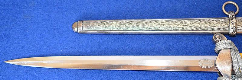 GERMAN ARMY OFFICERS DAGGER 1935 MODEL BY HOLLER COMPLETE WITH SILVER KNOT.