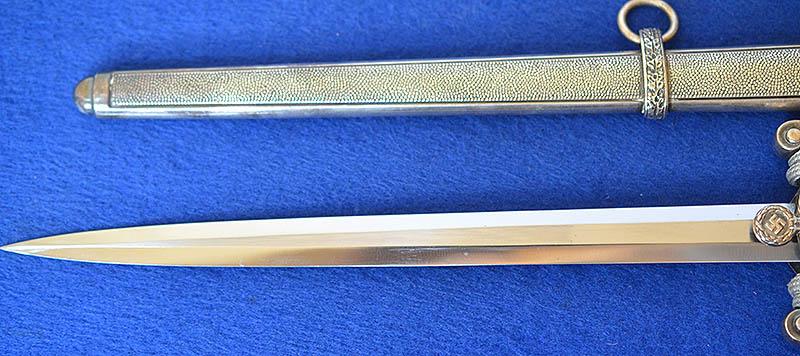 GERMAN ARMY OFFICERS DAGGER 1935 MODEL BY HOLLER COMPLETE WITH SILVER KNOT.