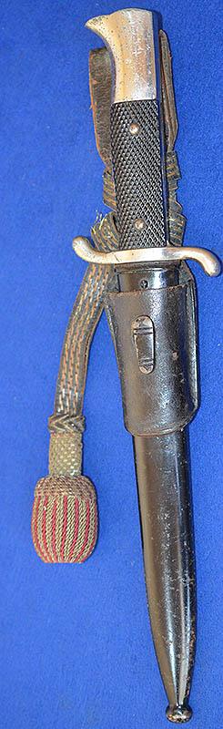 THIRD REICH NCO SHORT MODEL FIRE SERVICE BAYONET WITH MINT SAWBACK BLADE COMPLETE WITH FROG AND KNOT.