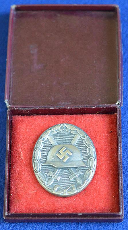 THIRD REICH CASED SILVER WOUND BADGE BY STEINHAUER & LUCK.